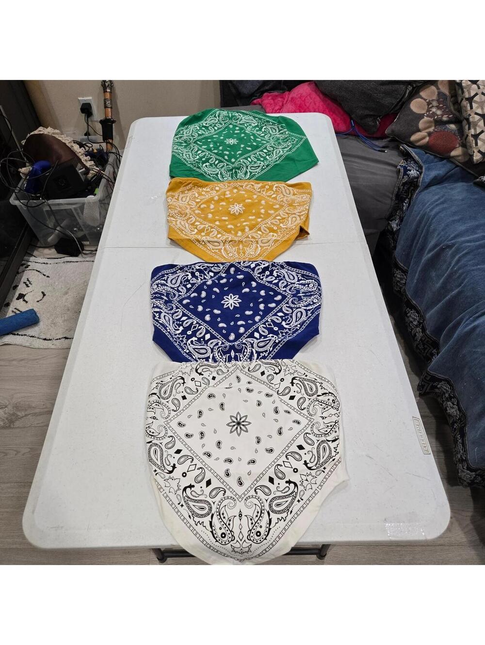 4 bandana crop tops in white, blue, yellow, and green with white paisley designs